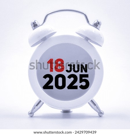 18 june 2025,calendar concept, clock background  Royalty-Free Stock Photo #2429709439