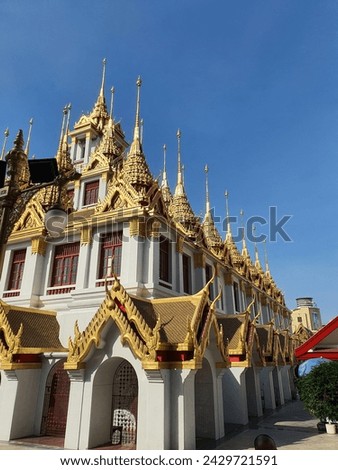 Picture of the golden metal castle at Wat Ratchanadda in Bangkok, Thailand.