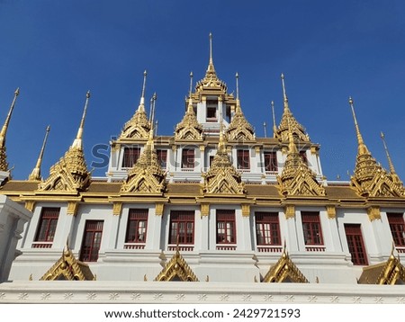 Picture of the golden metal castle at Wat Ratchanadda in Bangkok, Thailand.