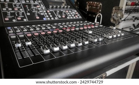 Studio sound mixer or equalizer in the voice recorder room to make the voice better while being recorded 