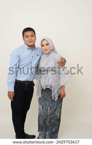 Asian couple doing pre-wedding with a white background and various poses