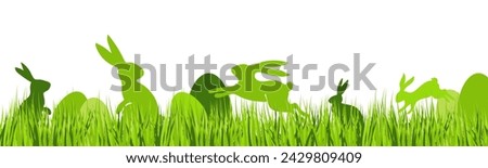 Easter border with easter bunny and colored eggs hiding in realistic green grass isolated on white. Egg Hunting clip art. Vector illustration