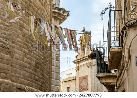 buildings of the historic centre of the medieval town of Bitetto with  decoration for patronal feast, Bari province, Puglia region, Italy, Europe