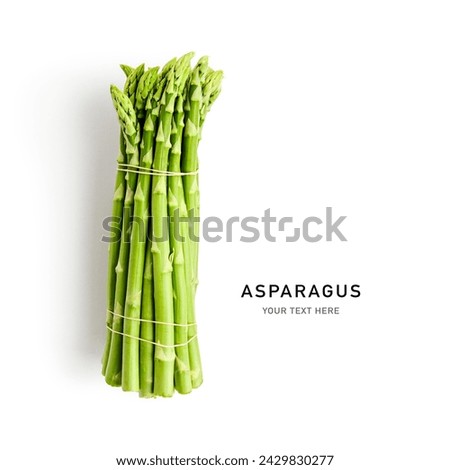 Fresh green asparagus bunch isolated on white background. Creative layout. Healthy eating and dieting food concept. Design element. Top view, flat lay
