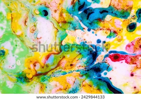 Liquid paint of vibrant colors. Unique and unrepeatable abstract art.