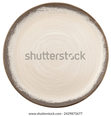 Trendy Circle Beige sand grain texture handmade Ceramic Dish plate, top view stoneware plate isolated white.  Royalty-Free Stock Photo #2429873677