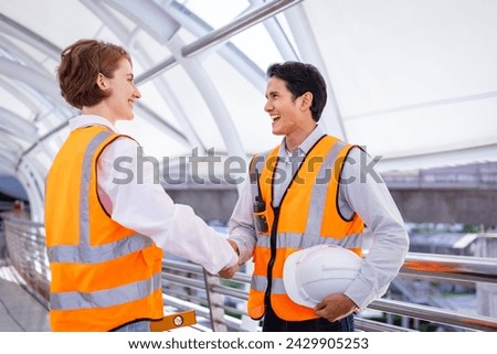 Team of diversity engineer is having and handshake after done inspecting the construction project for modern architecture and real estate development hand over concept Royalty-Free Stock Photo #2429905253