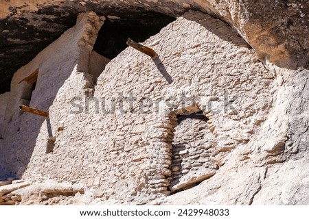 Walking inside Gila Cliff Dwellings caves. New Mexico, USA. Royalty-Free Stock Photo #2429948033