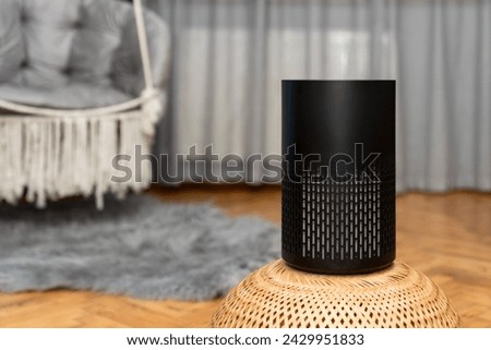 Air purifier health technology in cozy modern living room and cleaning removing dust PM2.5, Air purifier for fresh air and healthy life, Health care Air Pollution Concept. clean dust and fresh home Royalty-Free Stock Photo #2429951833
