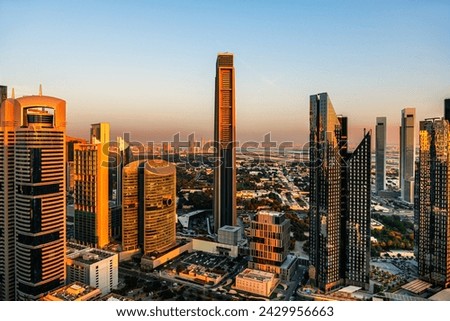 Dubai downtown skyline with modern skyscrapers at sunset. Dubai, United Arab Emirates. Famous travel destination Royalty-Free Stock Photo #2429956663