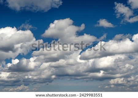 The beauty of nature for graphic design, natural beauty, ecology and clean air. Bright blue sky with white clouds for background or wallpaper. For desktop background, wallpaper. Natural textures.