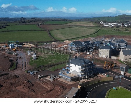 Paignton, Torbay, South Devon, England: DRONE VIEWS: A new build housing construction site on green belt land on the outskirts of Paignton. Paignton is a popular UK holiday resort (PHOTO 9).