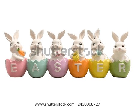 easter bunny rabbits with easter eggs isolated on white