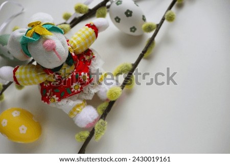 Easter card design. Easter eggs, Easter bunny and willow branches