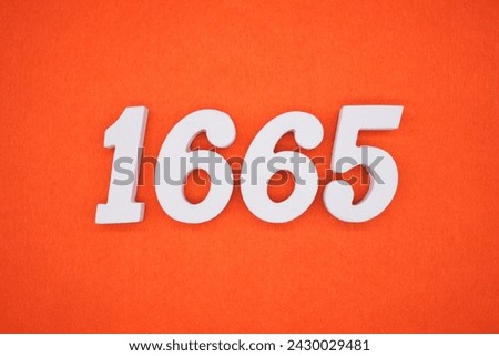 Orange felt is the background. The numbers 1665 are made from white painted wood.