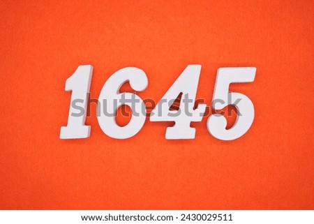 Orange felt is the background. The numbers 1645 are made from white painted wood.