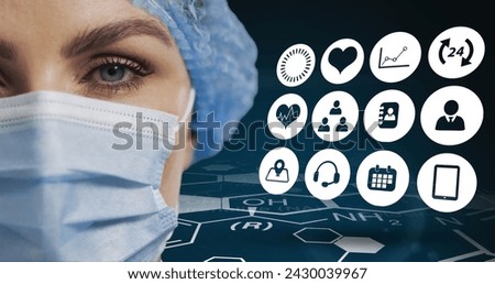 Multiple medical icons against portrait of caucasian female surgeon wearing face mask. medical research and technology concept