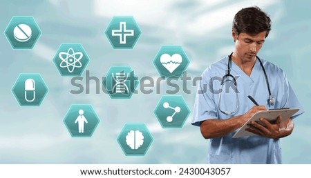 Multiple medical icons against portrait of caucasian male surgeon writing on clipboard and smiling. medical science and technology concept