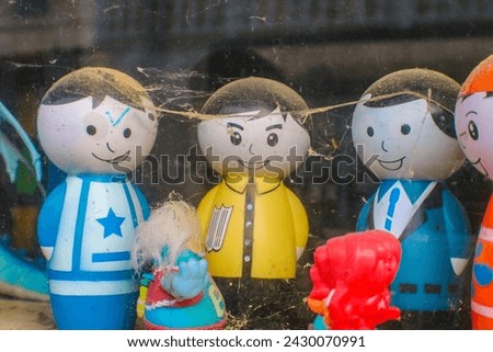 old toys covered in spider webs Royalty-Free Stock Photo #2430070991