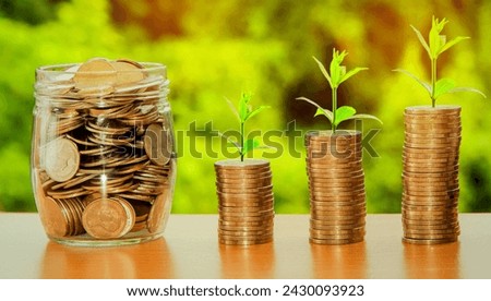 Money, Profit, Finance image with coins and jar 