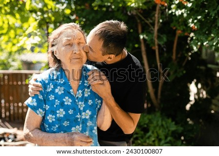 very old great-grandmother. senior old woman Royalty-Free Stock Photo #2430100807