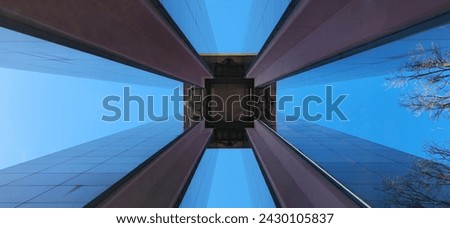 The image shows a close-up view of the top of the Carillon in Berlin-Tiergarten. The Carillon is a 42-meter-tall bell tower located in the Tiergarten park, near the Reichstag Building and the Brandenb Royalty-Free Stock Photo #2430105837