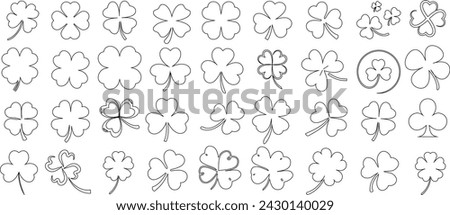 clover leaf line art, black outlines on white background. Ideal for fabric, wallpaper, wrapping paper designs. Nature inspired, simplistic, elegant Royalty-Free Stock Photo #2430140029