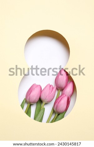 8 March greeting card design with tulips, top view. Happy International Women's Day