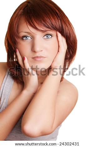 Beautiful young girl holding her face with hands
