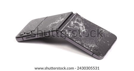 Broken display screen foldable smartphone on a white background