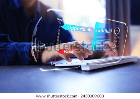 Risk and opportunity assessment concept with businessmen working with computer and data in bar graph format to analyze low risk and high opportunities in business and investment for good profit Royalty-Free Stock Photo #2430309603