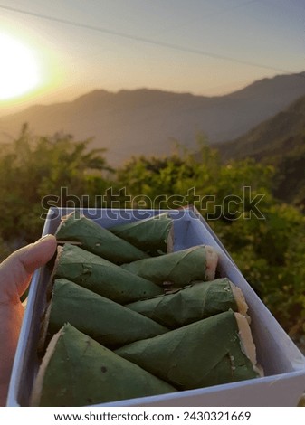 Singori is an interesting sweet from the state of. Uttarakhand that is made with khoya, sugar and. cardamom and is served in small maalu leaf cones. Royalty-Free Stock Photo #2430321669