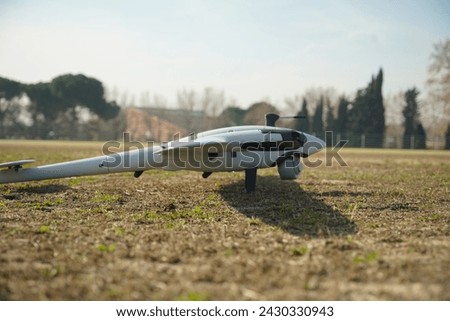 high tech uav plane about to perform its flight on a mission, on the ground, detailed military plane