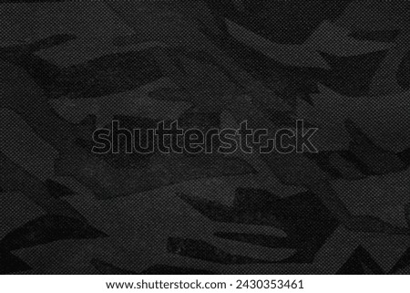 Texture of camouflage fabric as background, top view. Black and white effect