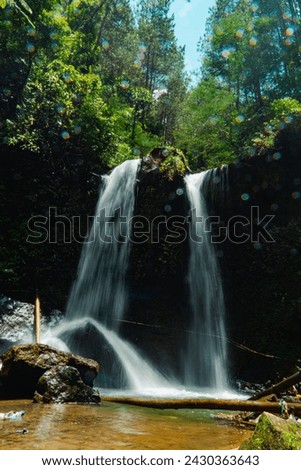 This unspoiled seasonal waterfall in the middle of the wilderness is called the Grenjengan Kembar waterfall. Detailed photos of the waterfall using a slow shutter speed technique