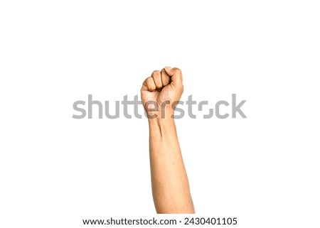 hands clenched into fists isolated on white background. concept International celebration labour day Royalty-Free Stock Photo #2430401105