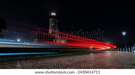   some light around the lighthouse of Urk with long shutter speed