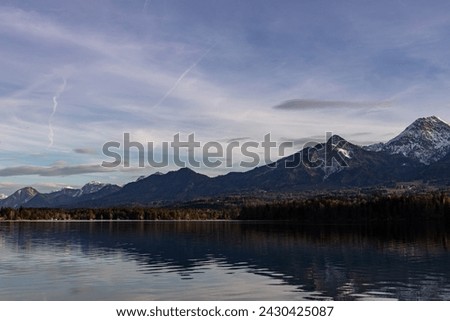 Lake Faaker See and the Karawanken ridge in Austria, Carinthia in winter Royalty-Free Stock Photo #2430425087