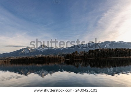 Lake Faaker See and the Karawanken ridge in Austria, Carinthia in winter Royalty-Free Stock Photo #2430425101