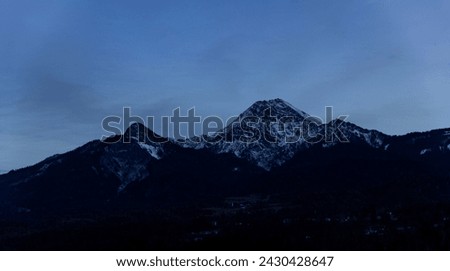 Lake Faaker See and the Karawanken ridge in Austria, Carinthia in winter Royalty-Free Stock Photo #2430428647