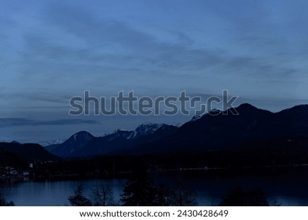 Lake Faaker See and the Karawanken ridge in Austria, Carinthia in winter Royalty-Free Stock Photo #2430428649