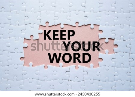 Keep your word symbol. Concept words Keep your word on white puzzle. Beautiful pink background. Business and Keep your word concept. Copy space.
