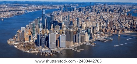 Helicopter view of New York City's famous skyline, from downtown to Billionaire's Row, February 2024