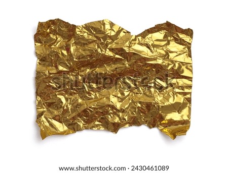 Torn empty crumbled  texture gold foil paper piece on white background.