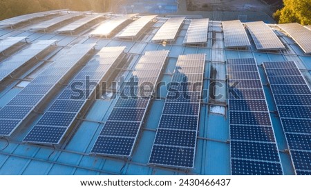 photo of solar panels PV modules mounted on flat roof photovoltaic solar panels absorb sunlight as a source of energy to generate electricity creating sustainable energy. Energia Solar Spain