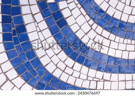 Vintage blue and white mosaic background. Mosaic pattern texture close up in retro style. Colorful polygons background.