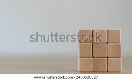 Blank wooden cubes on the table with copy space, empty wooden cubes for input wording, and an infographic icon.	

