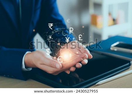 Currency exchange and international money transfer concept. Businessman searching virtual global currency exchange, foreign currency, international money transfer, financial online banking payment Royalty-Free Stock Photo #2430527955
