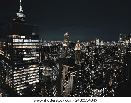 Rooftop view NYC city lights nighttime
