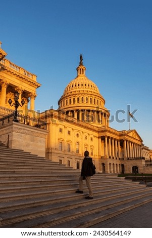 A tourist visit the Capitol Building in Washington, D.C., Enjoy sunrise in front of Capitol Building
